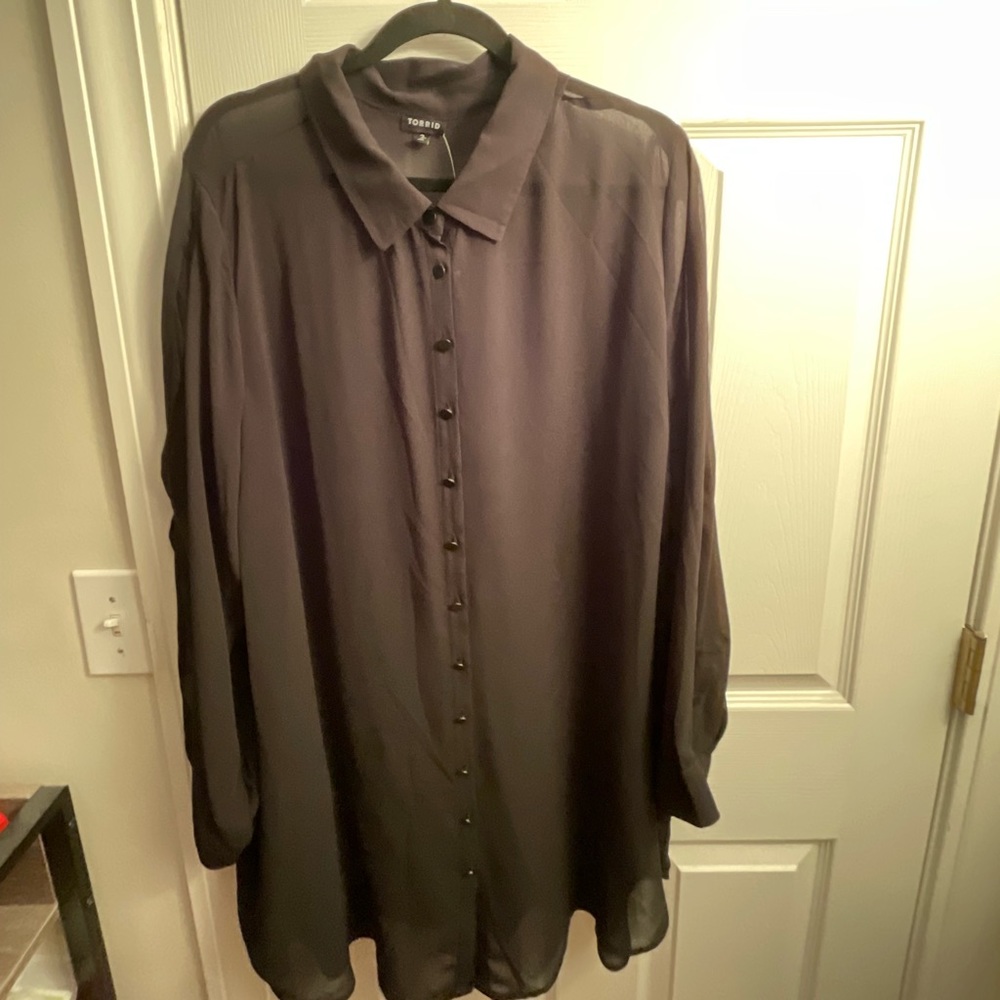 Black, sheer, long sleeve blouse with cut outs on the shoulders